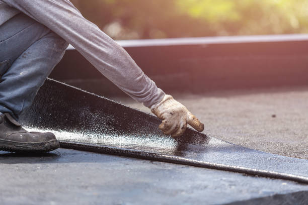 Professional Waterproofing technician working in Kingsford Heights, IN